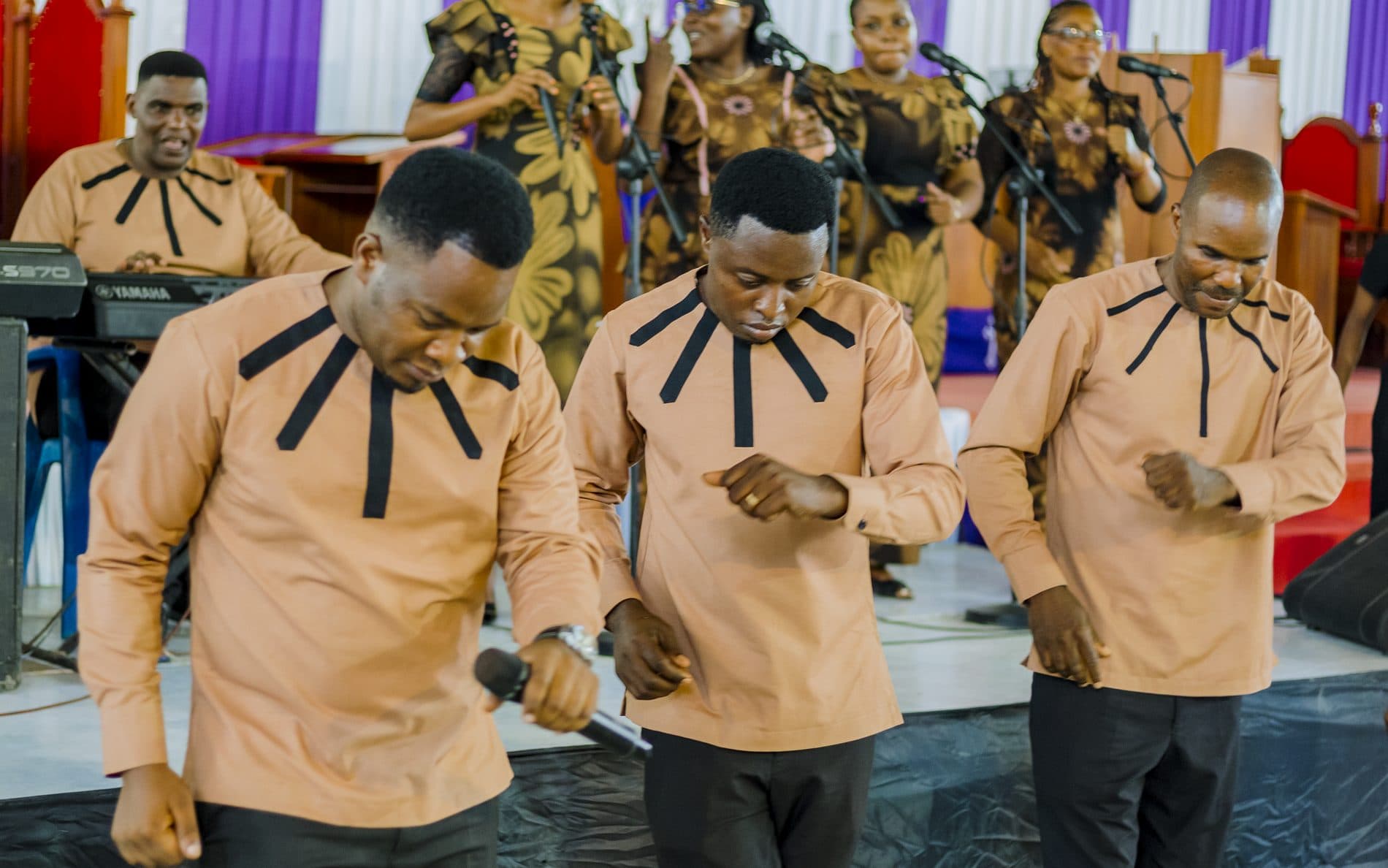 The evangelism team leading worship